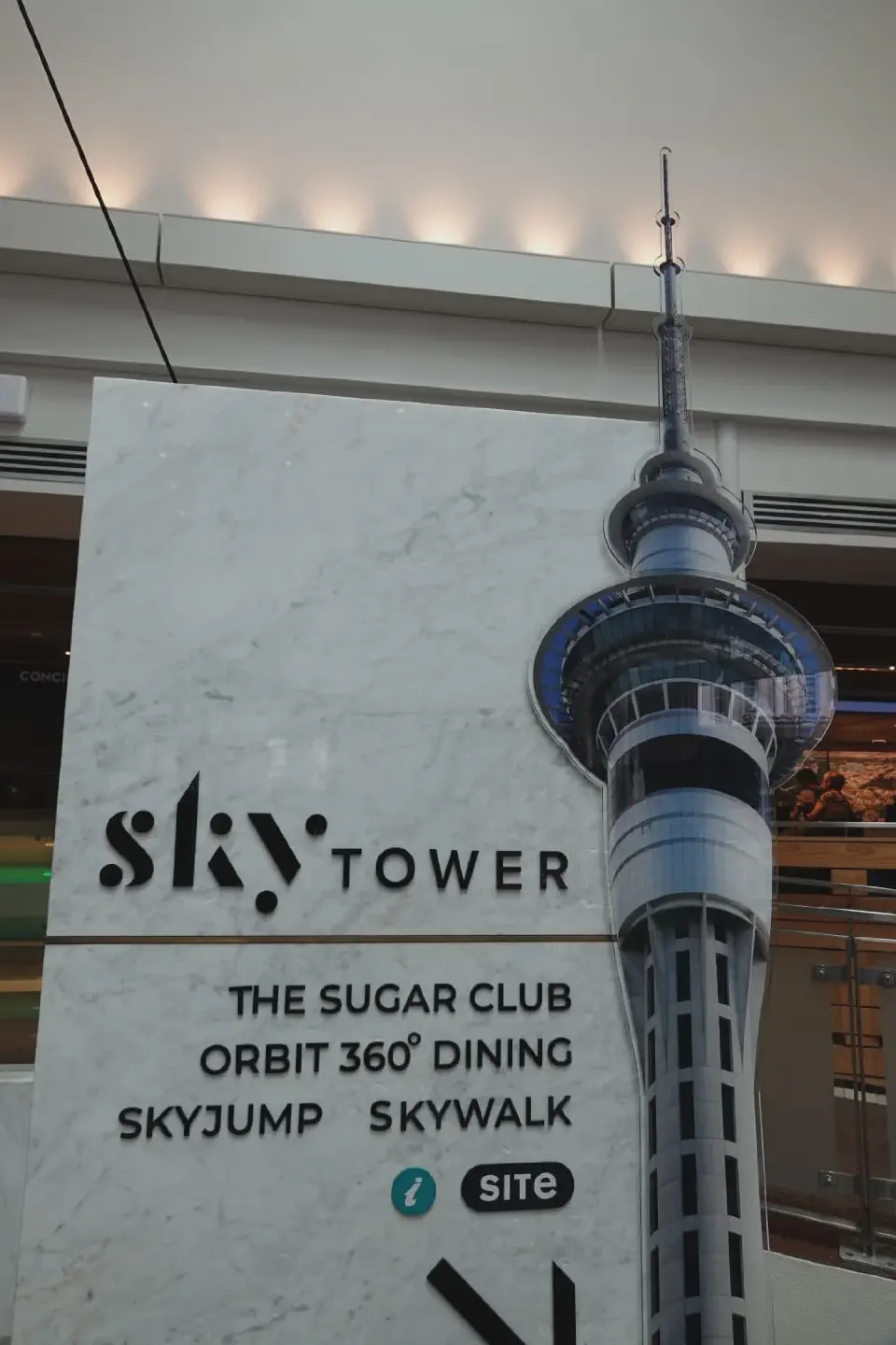 A promotional poster for the Auckland Sky Tower.