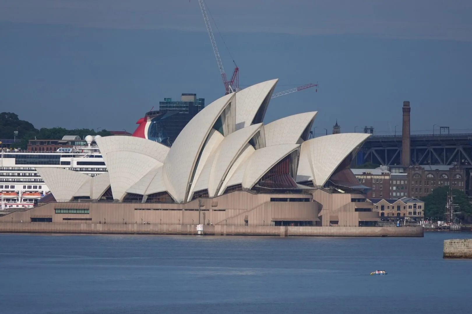 The world-famous Sydney Opera House, right by the harbor.