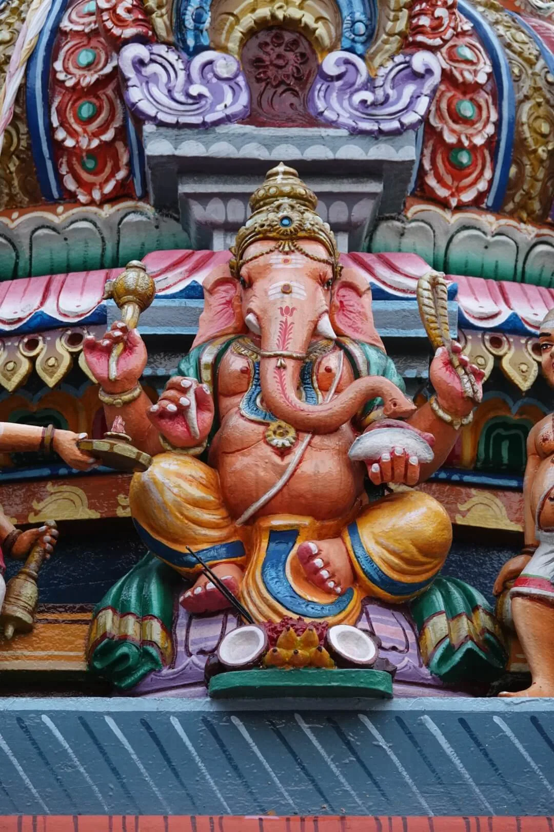 A detailed view of the ornate decorations at the Hindu temple.