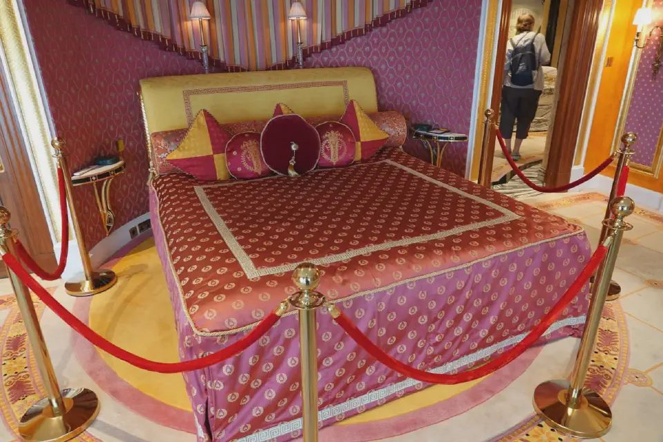 A luxurious bed inside one of the hotel's suites.