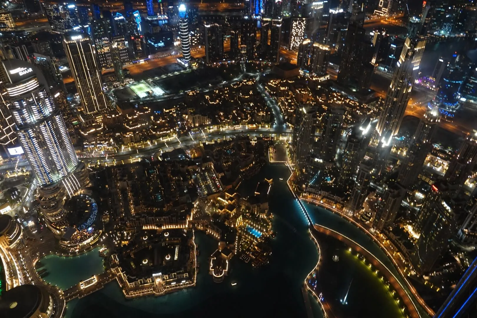 View from the Burj Khalifa overlooking Dubai at night.