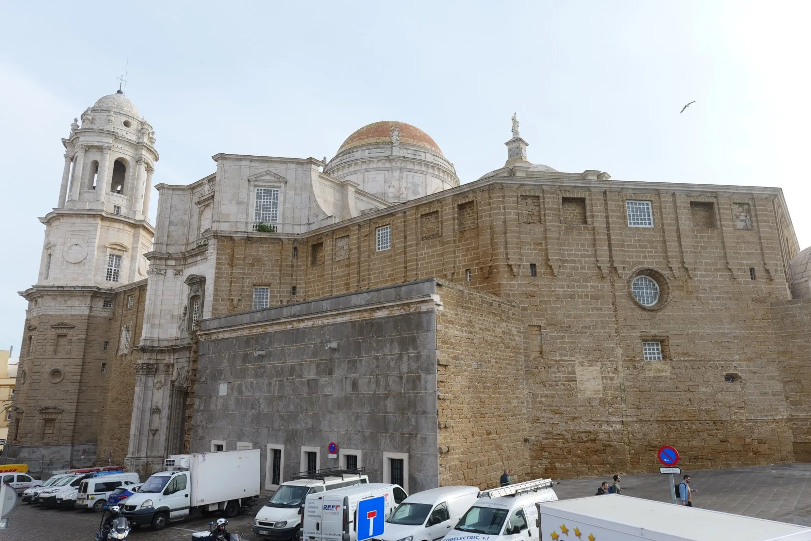 The Cathedral of Cádiz - from the rear, it reveals its fortified sandstone façade, crowned by its dome and towers.