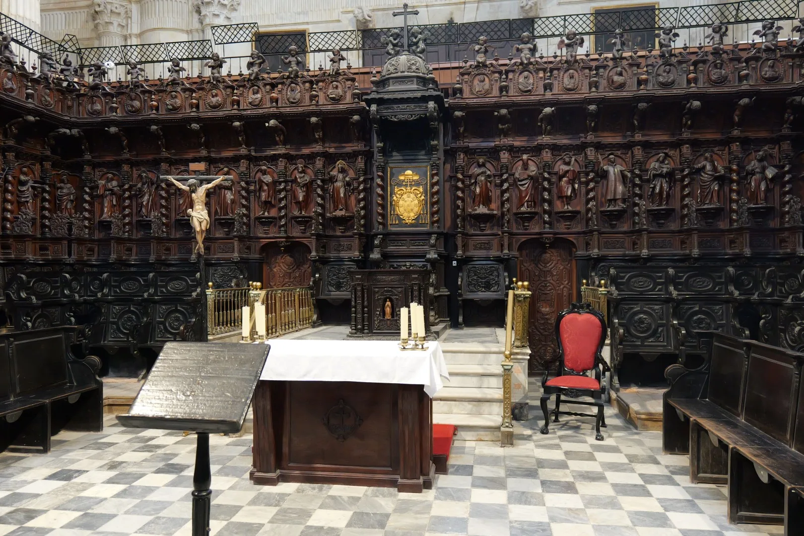 The richly decorated choir of the Cathedral of Cádiz - delicate wood carvings and artistic details define this impressive space.