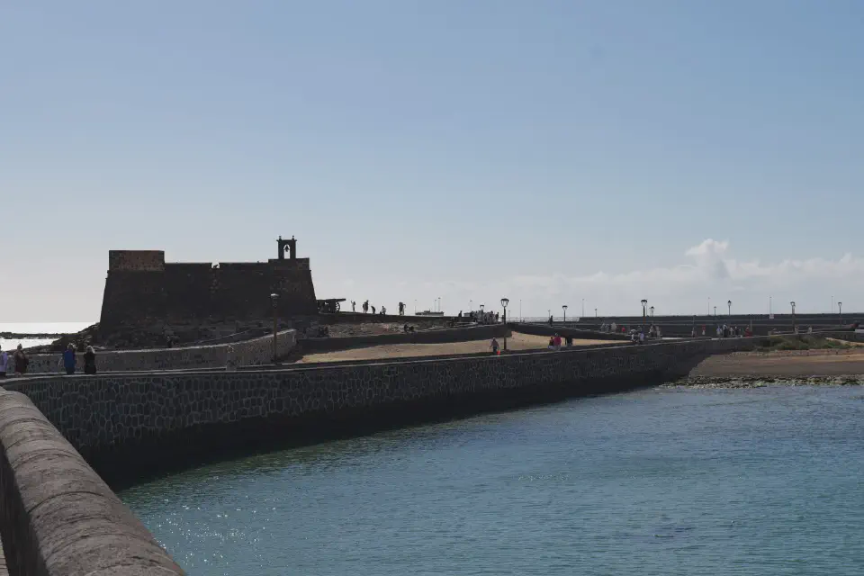 Castillo de San Gabriel, connected to the city by a stone bridge.