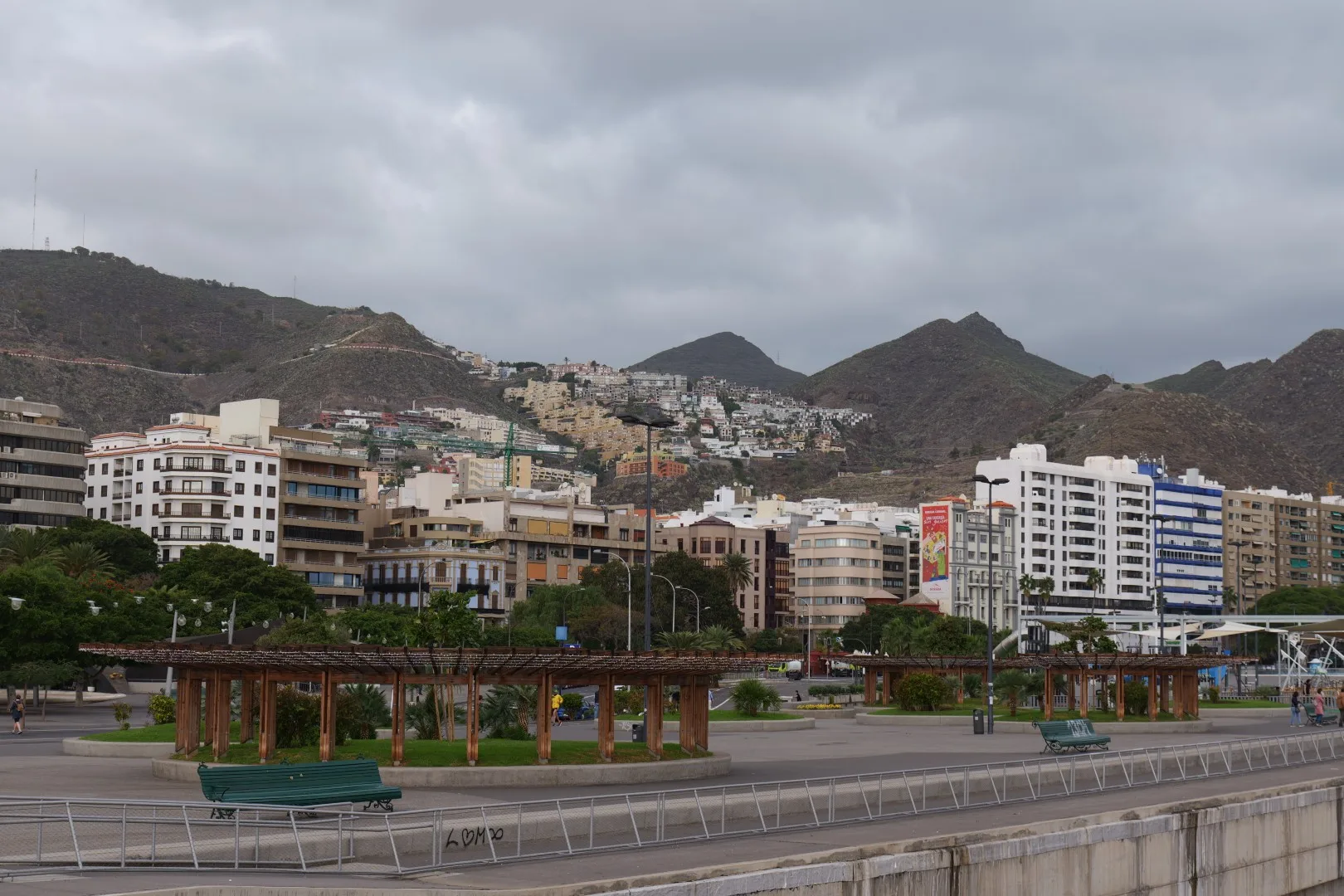 View of Santa Cruz de Tenerife with the surrounding mountains - a blend of urban life and stunning natural scenery.