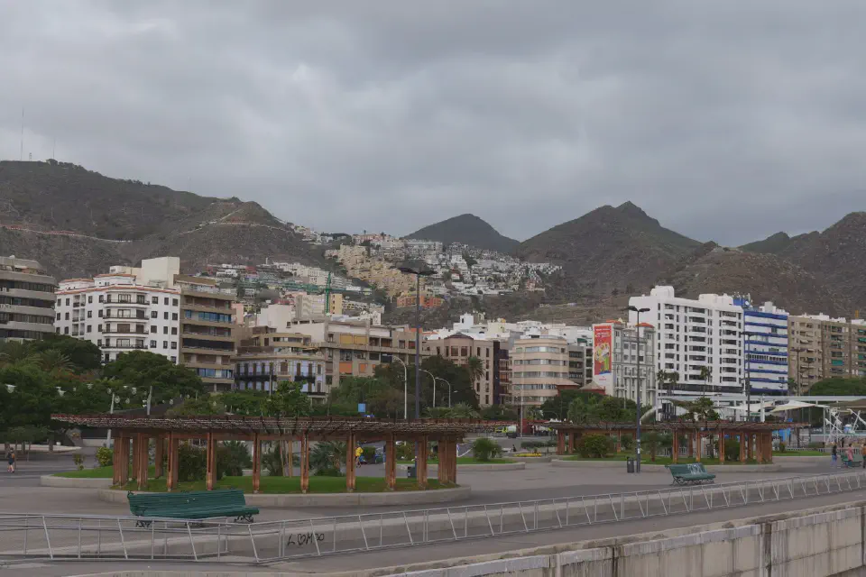 View of Santa Cruz de Tenerife with the surrounding mountains - a blend of urban life and stunning natural scenery.