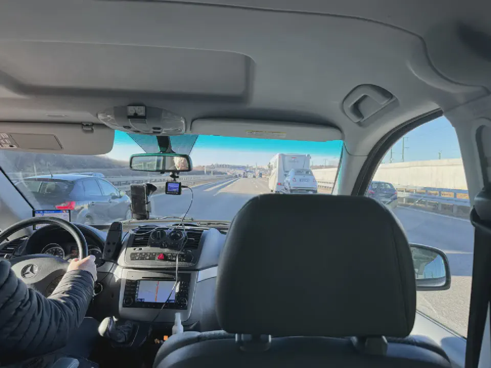 Return journey home - by taxi from Stuttgart to Pforzheim, while the familiar landscape passed by outside.